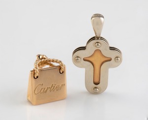 An 18ct two toned gold cross pendant; together with an 18ct gold handbag pendant branded Cartier, (2 items), ​​​​​​​10.5 grams.