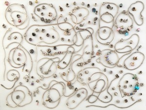 PANDORA assorted branded necklaces, bracelets, beads and charms, many stamped "925", (qty). Inspection will reward. 700 grams total including beads and non-silver components.