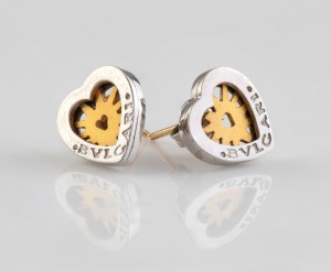 A pair of two toned 14ct white and yellow gold heart shaped earrings, branded "Bvlgari", 3.2 grams.