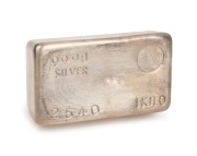 SILVER INGOT: A one kilogram 9998 silver ingot, minted by the Australian Bullion Company Pty. Ltd. Stamped No. 2540.
