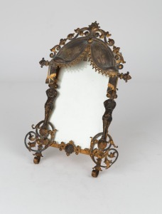 An antique Continental picture frame with silver and gilt finish, 19th century, 25 x 17cm overall