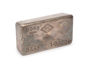 SILVER INGOT: A one kilogram 9998 silver ingot, minted by the Australian Bullion Company Pty. Ltd. Stamped No. 8398.