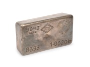 SILVER INGOT: A one kilogram 9998 silver ingot, minted by the Australian Bullion Company Pty. Ltd. Stamped No. 8398.