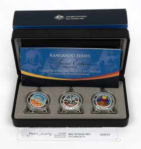 GREAT AUSTRALIANS ARTISTS IN COLOUR: RAM 2009 Kangaroo Series Special Edition set, comprising three $1 1oz silver proofs featuring Rolf Harris, Reg Mombassa, and Ken Done, in original case with CoA and box.