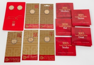 CHINESE LUNAR YEARS: Group of eleven carded uncirculated issues, comprising 2007 Pig $1, 2008 Rat $1, 2013 Snake 50c, 2014 Horse $1/50c, 2015 Goat $1/50c, 2016 Monkey $1/50c, and 2020 Rat $1 two-coin set/50c. (11 items)