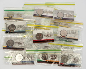 RAM 'Australia At War' 2014-16 complete set of eighteen carded uncirculated 50c commemorative coins. (18 items)