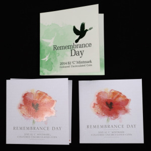 REMEMBRANCE DAY: RAM 2014 & 2015 (x2) $2 'C' Mintmark carded uncirculated coloured coins. (3 items)