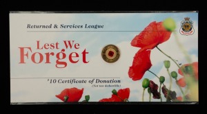REMEMBRANCE DAY: 2012 RAM Returned & Services League 'Lest We Forget' circulating commemorative $2 coin, on $10 Certificate of Donation card.