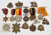 A group, including two 1914-18 British War Medals, a 1941-5 Burma Star, a 1939 German medal, various English County military hat badges, a 1964 Malawi Independence medal, a Rhodesia 1965 Independence silver medal, etc. (Total: 17 items).