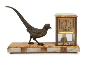 A French Art Deco mantle clock with spelter pheasant decoration on an onyx and marble base, circa 1925, 28cm high, 50cm wide.