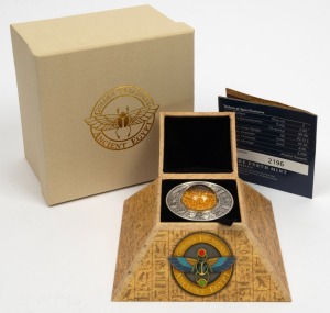 Tuvalu: ANCIENT EGYPT: Perth Mint 2019 'Golden Treasures' two Tuvaluan dollars 2oz silver antiqued coin, limited edition 2196/2500, in original unusual pyramid case with CoA and box. The centre of the coin features a perspex bubble filled with 24ct gold p