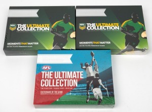 Group of three unopened RAM 'The Ultimate Collection' frosted uncirculated silver coin/trading card/maxicard sets, comprising 2015 NRL 'Moments That Matter' (x2), together with 2015 AFL 'Custodians Of The Game'. (3 items)