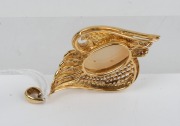 An 18ct yellow gold pendant, set with an impressive solid opal, surrounded by brilliant cut diamonds, 5cm high overall, 10.5 grams. - 2