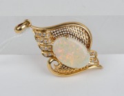 An 18ct yellow gold pendant, set with an impressive solid opal, surrounded by brilliant cut diamonds, 5cm high overall, 10.5 grams. - 3