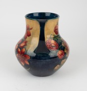 MOORCROFT "Protea" rare twin-handled English pottery vase, finely decorated with large protea flowers and the reverse decorated with a spray of African Lilies, circa 1928, impressed signature mark to base "W. Moorcroft, Potter to H. M. The Queen. Made in - 5