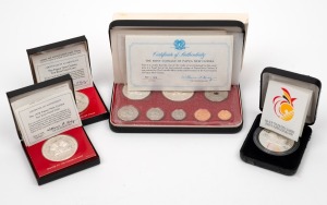 Papua New Guinea: 1975 eight coin Proof set, 1975 10k silver Proof, 1978 10k silver proof, 1991 10k silver South Pacific Games proof, all in cases of issue with certificates.