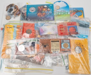 AUSTRALIAN INSTITUTIONS: Group of thirty-one RAM carded uncirculated issues, including 2003 'Australia's Volunteers - Making a difference' six-coin set, 2011 50c '50 Years Of Triple Zero', 2011 $1 '100 Years of Census', 2012 $1 'Australian Year of the Far