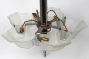 An Austrian Art Deco metal and glass hanging light with five glass shades, circa 1925; together with a red Murano glass hanging light shade with gold inclusions, (2 items), the hanging light 63cm high (not including chain) - 2