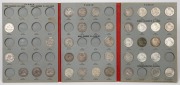 SHILLINGS: 1910 - 1963 collection in a push-in folding album; 1910, 1912, 1917, 1918, 1922, 1924-28, 1934, 1936 and most of the 1940 - 1963 issues are present but the early years are poor. (38), poor - EF.