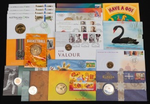 Group of sixteen Australian c. 2000s philatelic numismatic covers, including of note 2000 Centenary of Australia's First Victoria Cross and 2005 Year of the Rooster, together with 1990 Western Australia $10 silver uncirculated coin, in original packaging. (17 items)