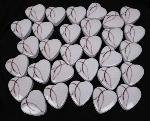 CAMEROON: 2010 1000fr Amour Toujours "Angels of Love" sterling silver hologram coins, each in an individual heart-shaped tin. (30).