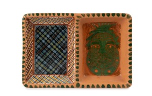 TIWI POTTERY savory dish with cross hatched and hand-painted portrait finished with sgraffito decoration, incised "Tiwi Pottery, N.T. '09 J.P. Nguiu, Bathurst Is. N.T.", 22cm wide.