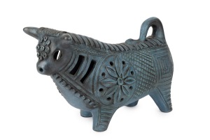 McLAREN blue glazed pottery bull, incised "McLaren", 16cm high, 21cm long