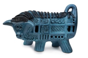 McLAREN blue glazed pottery bull statue, incised "McLaren", 19cm high, 27cm long