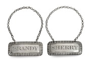 THOMAS ROBINSON (THE CONVICT SILVERSMITH) pair of sterling silver decanter labels, with attached bottle-neck chains, early 19th century, 5.5cm wide, 20.5 grams total.