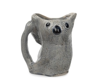 MERRIC BOYD pottery koala jug with applied gumnuts and branch handle decoration, signed "M. Boyd, 1925", 16cm high