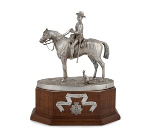 LIEUTENANT COLONEL TOM PRICE - VICTORIAN MOUNTED RIFLES: Spectacular solid cast Australian silver statue of Colonel Price on horseback with regimental wallaby mascot, mounted on Tasmanian blackwood base, unknown maker, 29cm high overall.