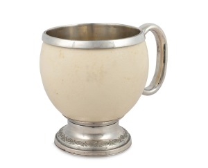 415 · HENRY STEINER antique Australian silver mounted ostrich egg tankard, 19th century, stamped in two places "H. Steiner" flanked by pictorial marks, 14cm high, 16cm wide.