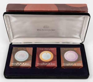 MILLENNIUM SERIES SILVER PROOFS: Collectors set of three RAM coins, two of which gold-plated, all in original cases with box, gathered together into velvet lined box with card sleeve, comprising 1999 The Past, 2000 The Present, and 2001 The Future.
