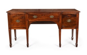 An early Colonial Australian cedar six leg sideboard in the Sheraton manner with huon pine stringing, diamond escutcheon inlays, tapered legs terminating in spade feet, New South Wales origin, circa 1820. Each drawer blade veneered in cedar on solid beefwood rails, otherwise cedar secondary timbers with a couple of scrub cut Baltic pieces to the carcass plus some eucalyptus secondaries. Restored and refinished at some time in the late 20th century. 91cm high, 173cm wide, 57cm deep.