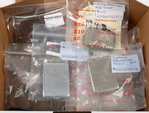 A small carton containing a quantity of pre-decimal Australian coins to One Shilling, a quantity of 1c and 2c coins, various medals, medallions, souvenirs and 3 vintage vesta cases. A very mixed lot!