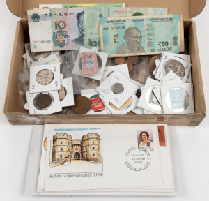 An accumulation of Australian and foreign coins and banknotes, some stamps and covers in a small carton.