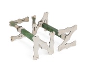 FRANK GRADY of Wellington pair of antique New Zealand silver and greenstone "N.Z." knife rests, 19th/20th century, stamped "F. GRADY, ST. SILVER", 4cm high, 7.5cm wide.