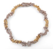 An impressive shell bead necklace in the manner of Lola Greeno, 75cm long.