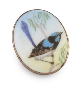 An antique 9ct rose gold mounted porcelain brooch with hand-painted fairy wren, early 20th century, stamped "9ct", 3.5cm high.
