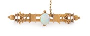 DUGGIN, SHAPPERE & Co. of Melbourne antique 15ct gold bar brooch, set with a solid cabochon opal, 19th/20th century, stamped "15" flanked by pictorial marks, ​​​​​​​5.5cm wide, 4.2 grams.