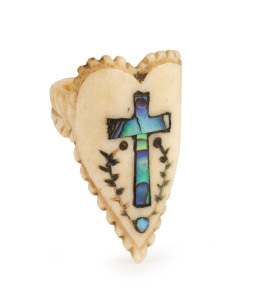 An antique carved whalebone sweetheart toggle inlaid with abalone shell, 19th century, 3cm high
