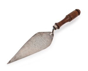 [ROCKHAMPTON INTEREST] Australian silver presentation trowel with turned blackbean handle, engraved "PRESENTED TO THE RIGHT HONOURABLE REVEREND DR. STAUNTON BISHOP OF NORTHERN QUEENSLAND ON THE OCCASION OF HIS LAYING THE CORNER STONE OF THE CHURCH OF ST. PAUL, ROCKHAMPTON, 16th SEPTEMBER, 1879", 32cm long.