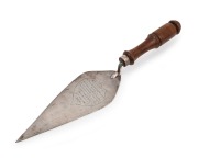[ROCKHAMPTON INTEREST] Australian silver presentation trowel with turned blackbean handle, engraved "PRESENTED TO THE RIGHT HONOURABLE REVEREND DR. STAUNTON BISHOP OF NORTHERN QUEENSLAND ON THE OCCASION OF HIS LAYING THE CORNER STONE OF THE CHURCH OF ST. 
