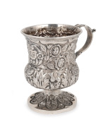 JOSEPH FORRESTER rare and important Colonial Australian silver christening mug with thistles, acanthus, roses and shamrock repousse decoration and strap handle, Hobart Town, Van Diemen's Land, circa 1842-46, stamped with pseudo hallmarks "J.F." lion passa