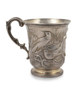 WILLIAM EDWARDS of Melbourne, antique sterling silver christening mug with repousse Australian bird decoration and engraved monogram, mid 19th century, stamped "W.E." in addition to the English hallmarks for London, circa 1853, 9cm high, 117 grams.