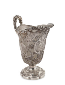 403 · WILLIAM EDWARDS (attributed) of Melbourne, antique Australian silver pierced jug decorated with parrots, birds and grapes, adorned with engraved bird armorial crest, mid 19th century, with original glass liner, 14.5cm high, 225 grams (not including glass liner).
