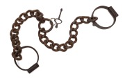 Convict light weight "Plug" leg irons with key, 19th century, ​​​​​​​80cm long overall.