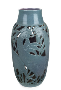 KLYTIE PATE pierced pottery vase with cockerel decoration, glazed in turquoise with mauve interior, incised "Klytie Pate, 1988", 34cm high.