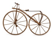 VELOCIPEDE (BONE SHAKER) rare and early Australian redgum and blacksmith make bicycle, Barossa Valley, circa 1860s, 130cm high, 190cm long, front wheel 98cm diameter.