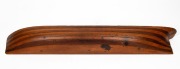Half hull boat builder's antique model, cedar and pine laminated construction with removable peg joints, 19th century, 10 x 72cm. - 2